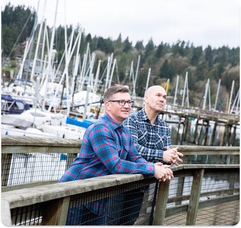 built mighty woocommerce website development founders looking over marina on bridge