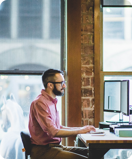 built mighty employee at desk for custom subscription platform